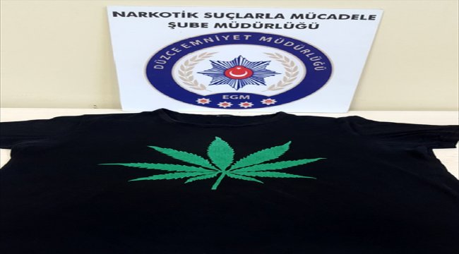Giydiği tişört yakalattı