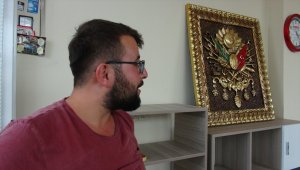 Kafasına tablo düşen esnaf yaralandı