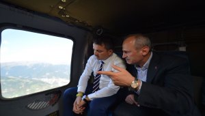 Bakanlar Turhan ve Pakdemirli, Yusufeli Barajı'nı helikopterle havadan inceledi