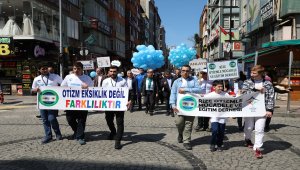 Otizmli çocuklar için tulum eşliğinde yürüdü
