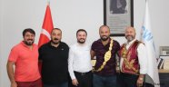 CW Enerji, başpehlivan Orhan Okulu'yu tebrik etti