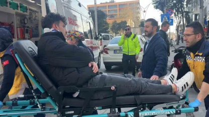 Otomobile çarpmamak isterken düşen motosiklet sürücüsü yaralandı