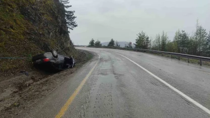 Takla atan otomobilden yara almadan kurtuldu